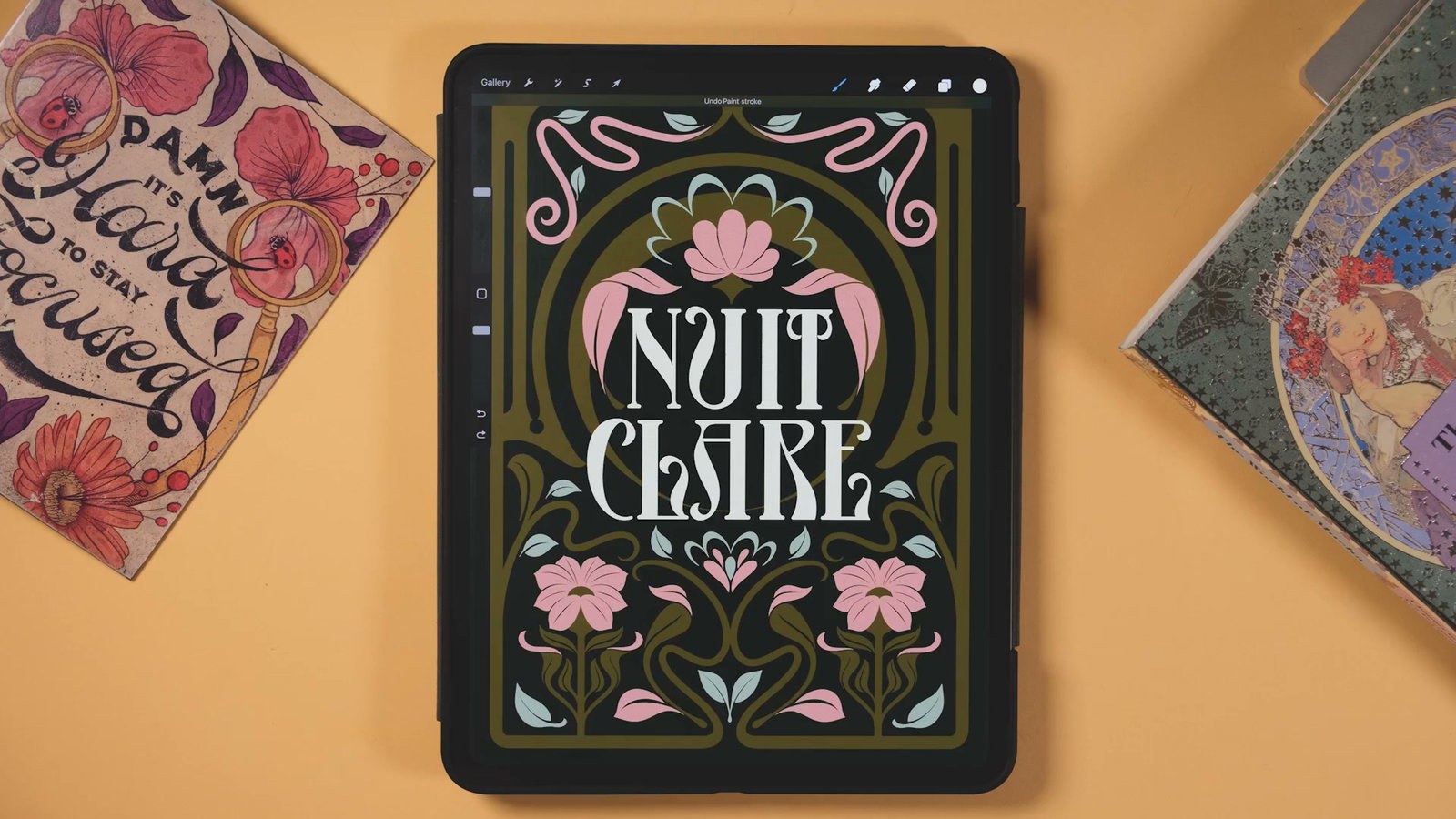 The finished NUIT CLAIRE Art Nouveau poster on an iPad